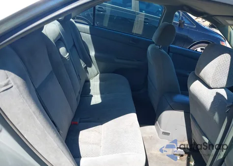 2003 Toyota Camry Le z USA, uszkodzony, nr VIN 4T1BE32K43U767501